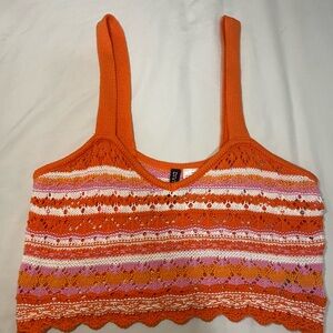 Orange, pink, and white pattern crochet top
